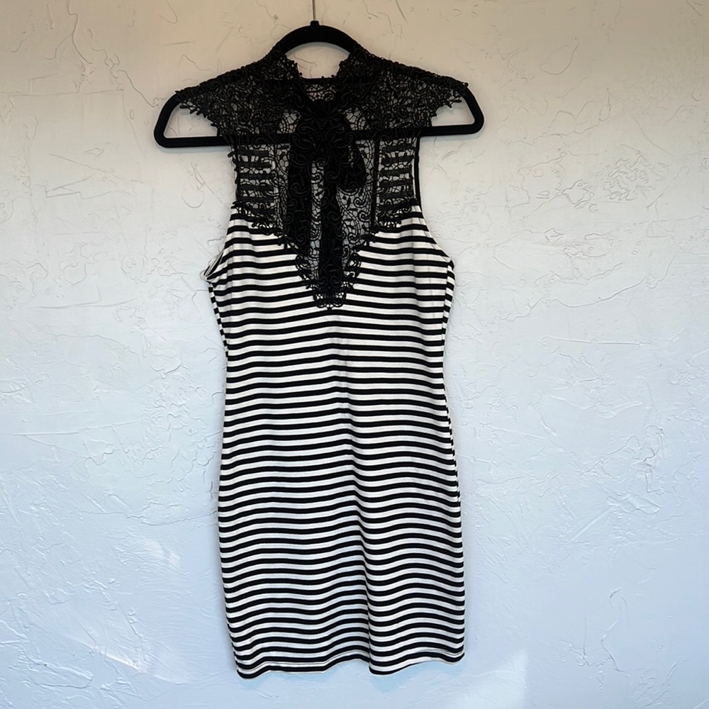 Black and white mini dress with lace top, size medium.